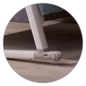 Tutti Bambini Cozee Sense Bedside Crib - rocking arches and lackable castors