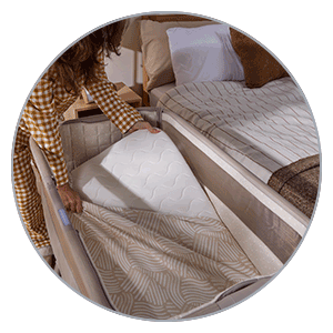 Tutti Bambini Cozee Sense Bedside Crib - breathable bassinet and deeper storage tray